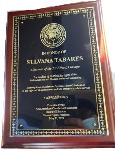 Plaque presented by Chamber President Hassan Nijem in gratitude to Ald. Silvana Tabares for helping to save Chicago's Arab owned Hookah lounges and saving more than 200 jobs in the city. Photo courtesy of Ray Hanania